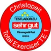 A circular badge with text and logos indicating a product test result. Produktbild-Vorschau