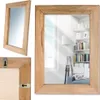 A collage of images showing a rectangular mirror with a wooden frame, including a close-up of the back with mounting hardware. Produktbild-Vorschau