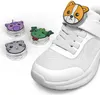 A set of four animal-themed accessories for Apple AirTags, shown next to a white sneaker. Produktbild-Vorschau