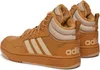 A pair of brown Adidas Hoops Mid sneakers with beige accents and faux fur lining, shown from a side-rear angle against a white background. Anteprima dell’immagine prodotto