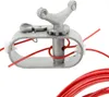 A close-up of a metal clamp with red wires running through it, against a white background. Produktbild-Vorschau