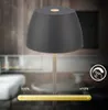 A close-up of a black LED table lamp with a dimmer slider and touch icon. Anteprima dell’immagine prodotto