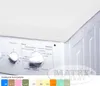 Close-up of the control panel of a white washing machine, with a white fabric cover draped over the top. Voir les images du produit