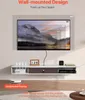 A wall-mounted TV stand with a TV mounted above it, showcasing different TV sizes. A robotic vacuum cleaner is on the floor below. Náhľad obrázku produktu