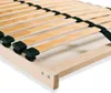 A close-up view of a wooden bed frame with slats and black plastic supports. Produktbild-Vorschau