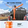 A truck bed with an orange crane installed, with a construction site in the background. The bottom part of the image shows a close-up of the crane's base mechanism. Anteprima dell’immagine prodotto
