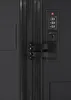 A close-up view of a black suitcase lock and zipper. Anteprima dell’immagine prodotto