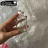 Set di 7 bottiglie in vetro da 50 ml con tappo – Mini Anteprima dell’immagine prodotto 7