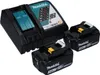 A Makita battery charger and two Makita batteries are arranged on a white background. Produktbild-Vorschau