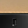 A close-up view of the top edge of a black metal shelf with a brown particle board shelf above it. A small rectangular cutout is visible on the black metal. Anteprima dell’immagine prodotto
