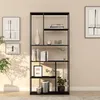 A black metal bookshelf filled with books and decorative items. Anteprima dell’immagine prodotto