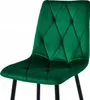 A close-up view of a green velvet chair. Anteprima dell’immagine prodotto