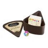 A Trivial Pursuit Harry Potter travel edition game set, including the game box, cards, and a die, is displayed on a white background. Náhled obrázku produktu