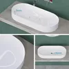 A collage of images showing a white washbasin from different angles, with dimensions indicated. Produktbild-Vorschau