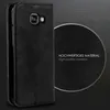 A black flip phone case is shown with a circular inset highlighting the material texture and text. Produktbild-Vorschau