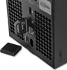 Close-up of the back of an Xbox Series X console with a WD_BLACK C50 expansion card plugged into one of the ports. A protective cap for the expansion card is also visible. Produktbild-Vorschau