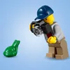 A Lego minifigure photographer is taking a picture of a green frog. Produktbild-Vorschau