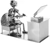 A metal figurine of a gamer sitting at a desk with a computer. Náhled obrázku produktu