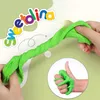 A hand is shown twisting a bright green slime or dough, with a smaller inset image of a hand giving a thumbs up with the same material. The brand name "SWEETOLINA" is displayed in colorful lettering at the top. Produktbild-Vorschau