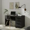 A home office setup with a black desk, a black chair, and a laptop. Produktbild-Vorschau