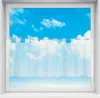 A white bistrogardine with loops hangs in front of a window showing a blue sky with clouds. Anteprima dell’immagine prodotto