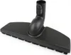 A black vacuum cleaner floor brush attachment on a white background. Produktbild-Vorschau