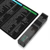 A black desk mat with keyboard shortcuts for Windows and Excel, and a black cylindrical packaging for a mousepad. Voir les images du produit