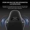 Close-up of the back of a black gaming chair with integrated speakers. Náhled obrázku produktu