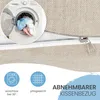 Close-up of a textured fabric with a zipper, showing a washing machine in a circular inset and icons with text below. Produktbild-Vorschau