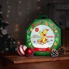 A Christmas advent calendar with a Haribo bear illustration, surrounded by Christmas ornaments and pine cones. Produktbild-Vorschau