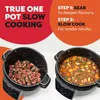 Two slow cookers are shown side-by-side, demonstrating the 'sear' and 'slow cook' steps of a recipe. Produktbild-Vorschau