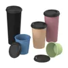 A collection of reusable coffee cups with lids in various colors, arranged on a white background. Voir les images du produit