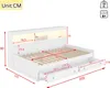 A diagram showing the dimensions of a white sofa bed with drawers and LED lighting. Voir les images du produit