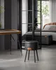 A stool with storage in a modern room with a bed and a keyboard stand. Náhled obrázku produktu