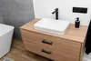 A modern bathroom sink with a wooden vanity and a black faucet. Podgląd zdjęcia produktu