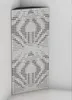A corner acoustic bass trap panel with a perforated pattern, placed in a room corner. Podgląd zdjęcia produktu