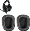 A pair of black ear pads and a black gaming headset with blue accents. Produktbild-Vorschau