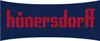 The image displays the brand name "HÜNERSDORFF" in red text on a dark blue background, with a curved shape at the top and bottom edges. Podgląd zdjęcia produktu