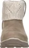 A front view of a single beige boot with a knitted cuff. Voir les images du produit