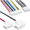 Close-up view of electrical wire connectors with multiple colored wires and white plastic connectors against a white background. Produktbild-Vorschau