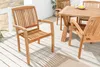 A wooden garden chair and table set on a wooden deck. Produktbild-Vorschau
