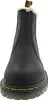 A front view of a black Dr. Martens boot with yellow stitching and a white fuzzy lining. Produktbild-Vorschau