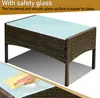 A rattan coffee table with a glass top, with a close-up inset showing a hand cleaning the glass. Podgląd zdjęcia produktu