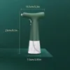 A green automatic oil sprayer with dimensions indicated by text overlays. Podgląd zdjęcia produktu