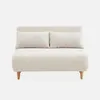 A cream-colored sofa with two pillows on a white background. Produktbild-Vorschau