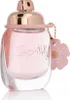 A perfume bottle with a flower charm. Voir les images du produit