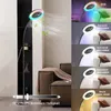 A floor lamp with a fan and RGB lighting is shown in a living room setting, with multiple inset images demonstrating different light color temperatures and the dimming feature. Anteprima dell’immagine prodotto