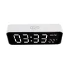 A white digital alarm clock with a black display showing the time and temperature. Anteprima dell’immagine prodotto