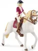 A toy figurine of a girl riding a white horse. Náhľad obrázku produktu
