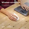 A person's hands are using a white wireless mouse connected to a laptop on a wooden desk. Produktbild-Vorschau
